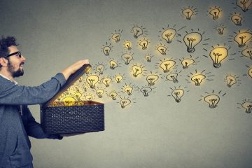 Image of man opening box of light bulbs