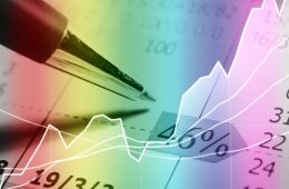 Image of a pen above a financial graph