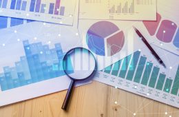 Image of graphs and charts on a desk