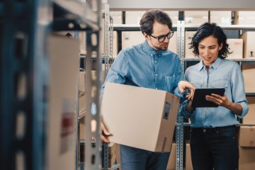 Image of man and woman in warehouse